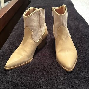 Size women’s 11 cream boots, worn once.